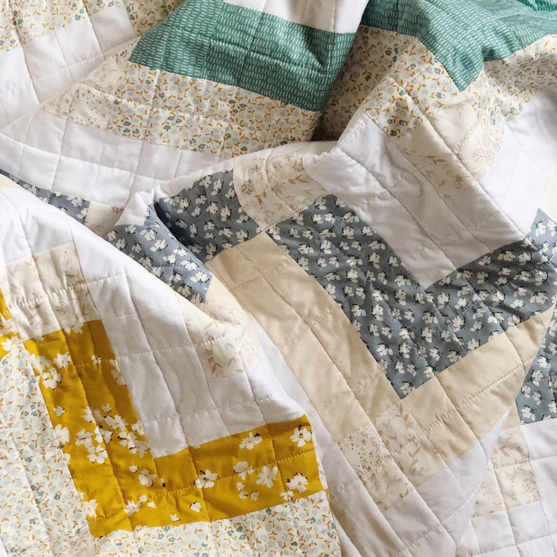 Blue, popular green and yellow throw quilt